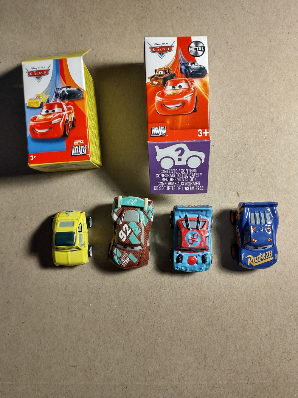 Disney Pixar Cars Mini Metal Diecast Lot – 4 Cars + 2 Empty Boxes